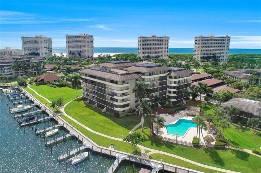 Enjoy lovely views of the Bay and amenities from this beautifully updated, two bedroom, two bathroom SouthSeas condo. A nicely updated, open kitchen is appointed with custom cabinetry, granite countertops, double stainless steel dual sink, recessed lighting, stainless steel appliance package and electric cooktop with travertine backsplash. The updates continue throughout, with fully updated bathrooms, neutral color scheme, custom casing at floors and ceilings, travertine tile, carpeted bedrooms and in unit washer and dryer. Located near the picturesque shores of TigerTail Beach on Marco Island, this condo offers the ideal island lifestyle. South Seas amenities include a pool, tennis courts, covered parking and eligibility to lease a boat dock from the South Seas Club.