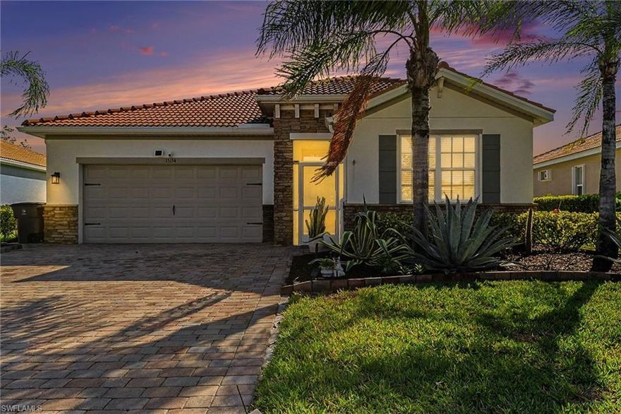 This stunning single-family home offers luxurious, maintenance-free living. It features 2 spacious bedrooms, 2 elegant bathrooms, and a versatile office/den accessible via beautiful French doors. The interior is designed with high-end finishes throughout, including soaring 8-foot doors, granite countertops, and modern stainless steel appliances.
Upgrades include: Driveway widened, New roof Aug. of 2022, gutters on front & back, lg 26x20 lanai with super screen & upgraded pavers, Top of the line Jacuzzi brand hot tub, Generator hook up, Luxury plank flooring in both bedrooms & flex rm., under cabinet lighting, granite countertops in bathrooms, new stove, microwave refrigerator, washer, dryer, Glass backsplash, complete interior repaint, garage fridge, ultraviolet air conditioning unit, overhead storage in garage and pull down attic ladder. 
The chef’s kitchen is a true highlight, equipped with a sophisticated wrapped island, custom backsplash, 42-inch cabinetry, and a walk-in pantry. Step outside to enjoy breathtaking, panoramic views of the long lake from your private backyard. The home is designed for peace of mind, featuring a surge protector and a Super screen system for seamless seasonal protection.
Move right in and immediately enjoy the resort lifestyle. A low HOA fee covers all essentials, including lawn care, high-speed cable and internet, and access to world-class amenities: a resort-style pool and spa, a state-of-the-art fitness center, and dedicated courts for pickleball, bocce, and tennis. This is an unparalleled opportunity to live in paradise.