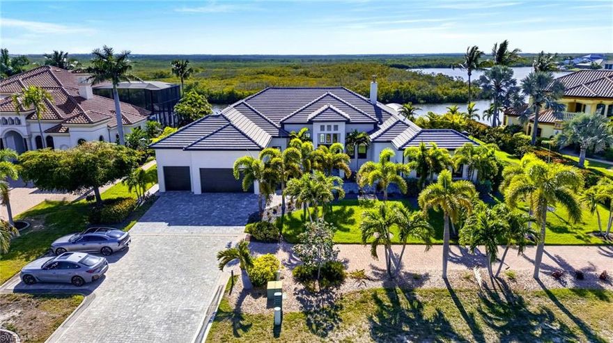 Experience the pinnacle of ultra-luxury living in this European-inspired modern and contemporary estate located in the prestigious community of West Cape Estates. Situated on the north spreader canal with western exposure, this property offers stunning sunset views of the preserve and intersecting canals.

The estate is a boater’s dream, featuring 140' of Titan composite decking, a 20,000 lb Golden boat lift, and a 35' boat slip (modifiable for a 40' boat) with direct access to open water in just 34 minutes with zero bridges!! Additional amenities include a 7,500 lb Golden lift with lowered dock for kayaks, a 120 SF Tiki Hut with full utilities including WIFI, and even a snook light for night fishing!

The interior boasts impeccable European design, including an elegant wood-burning fireplace that anchors the living area while the chef's kitchen dazzles with high-end appliances from Dacor, Bosch, Thermidor and Miele and a European inspired kitchen layout complete with a 21' floating island with custom cabinetry from Milino that has all the functionality of European design standards.

- Entertainment: Sound optimized Movie Theater with seating for 5 with Italian leather movie theatre style recliners, 13 Bowers & Wilkins speakers and subwoofers with a high performance Marantz processor, Sony 4K HD laser projector, and a 22TB Kaleidescape movie server.  Movies can be streamed, played from a high end BlueRay player or the Kaleidascape.
- Smart Home Features: Full integration of Smart Home System for security, sound, lighting, and electronic shades, all controllable via phone or dedicated panels.  
- Living Space: 12' ceilings with customized acoustic drop down ceiling panels for optimal sound absorption and 10' zero-corner sliders.   Audio sound system throughout the entire home and lanai area with James brand speakers.  Security system with motion sensors throughout.  High level quartz countertops throughout, Italian Madeli lighted mirrors with defoggers in all bathrooms, LED lighting with Lutron switchs and custom Milino European inspired floating cabinetry throughout bathrooms and bedrooms.  Every detail in this home has been curated to evoke sophistication, from the modern architecture style to the sleek, custom finishes!  The home is being sold fully furnished with high-quality furnishings from Scan Design. 

The outdoor oasis includes a 720 SF saltwater pool with negative edge, a "swim-in-place" feature, an 8-person heated spa, 4 fire burners, and a large outdoor kitchen area with fire pit and seating area and a spacious sundeck area.  Electric and gas heat available for the pool and spa.  The ODK is equipped with upgraded 24" gas grill with side burner and addtl Teppanyaki 19" griddle and refrigerator.  You can also enjoy the peaceful and serene setting in the Pergola and garden area with seating for 6!!

There are too many upgrades to list!!!  Schedule your private showing today to see this breathtaking home!!