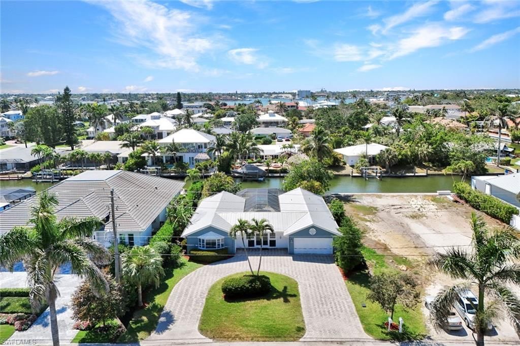 Photo of 1550 Sandpiper ST, NAPLES, FL 34102 (MLS # 225032910)