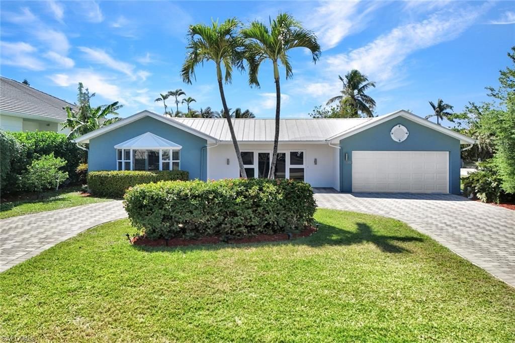 Photo of 1550 Sandpiper ST, NAPLES, FL 34102 (MLS # 225032910)