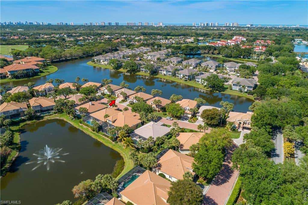 Photo of 2272 Island Cove CIR, NAPLES, FL 34109 (MLS # 225028986)