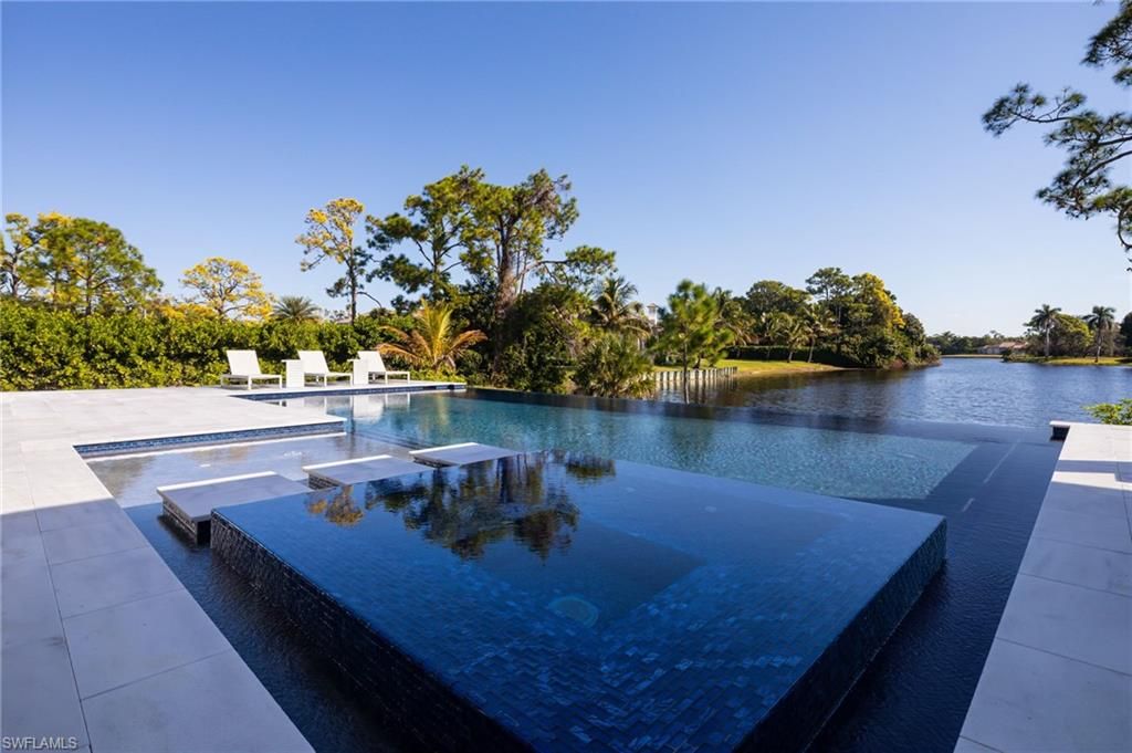 Photo of 6590 Trail BLVD, NAPLES, FL 34108 (MLS # 225080235)