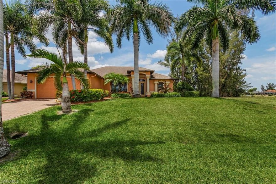 From the minute you pull up to this tropical oasis you will feel at home. This open and airy 3 bedroom 2 bath freshwater pool home features a wall of glass sliders that blur the lines of indoor and outdoor living. Rich warm colors and lush tropical landscaping transforms your mind into the ultimate Florida lifestyle. Tile in all the common areas with carpet in the bedrooms. Split floor plan is ideal for kids or guests. Pool bath offers easy access for fun in the sun. This home is situated on a serene canal with plenty of wildlife, fishing, boating, kayaking or paddle boarding right in the back yard! Plus the garage (mancave) is on it's own AC unit! Newer AC, water heater, pool pump and well pump all within the last 3 years. Don't wait this home won't last! Schedule your private showing today.