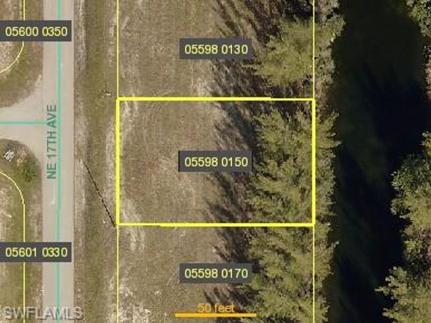 Great opportunity to build your dream home on this waterfront lot, in the heart of Gator Circle, quick access to stores and shopping. Fishing from your backyard!!