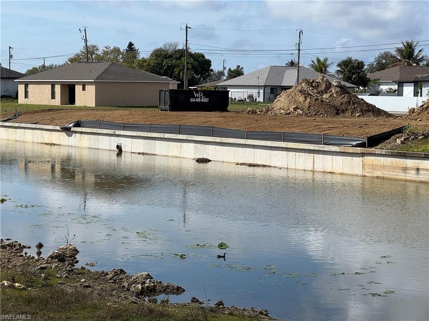 Build the waterfront home of your dreams.  NEW SEAWALL, city water and sewer and low assessments on a ready to build lot.  Great location next to shops, restaurants and schools. The lot next door is also for sale, buy both and build 2 homes or have a half-acre site for building larger plan with room for RV Garage and more.  Survey available.