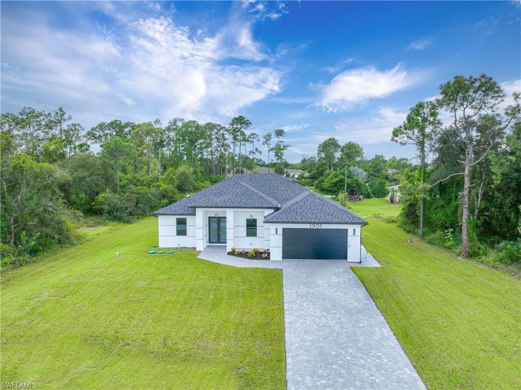 Photo of 3809 Sunset RD, LEHIGH ACRES, FL 33971 (MLS # 226013365)