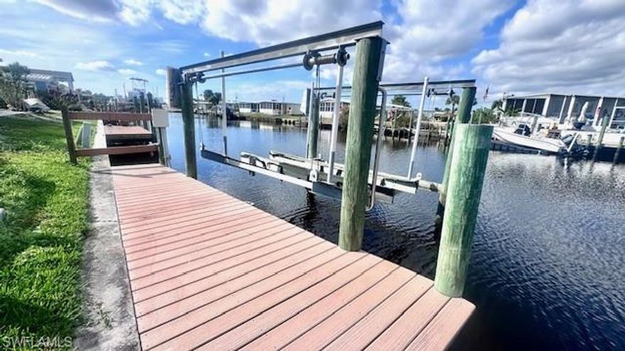 Beautiful WATERFRONT 2BR/2BA home in the desirable 55+ community of Old Bridge Village CO-OP. This upgraded manufactured home features stainless steel appliances, vinyl flooring, wood countertops, a kitchen island, and soft-close cabinets. The open concept layout offers great entertaining space, leading to a spacious covered patio and trek deck with serene waterfront views. The primary suite includes a large walk-in closet, walk-in shower, and the home stays cool with 4 mini-splits throughout. Enjoy a private trek dock for fishing or boating, plus an INCLUDED GOLF CART for easy community travel. Even if you dont have a boat, you can still enjoy the tranquility of living by the water watching for the dolphins and mantees that sometimes make an appearance.  Don’t miss this move-in-ready waterfront gem that also INCLUDES A SHARE in the Co-Op—schedule your showing today!
Old Bridge Village, is a friendly, 55+ resident owned community right off the Caloosahatchee River and Gulf Access with lots of amenities, activities all year, clubs and entertainment.  There is a resort style brand new pool with hot tub, fitness center, recreation center, bocce ball, pickleball, shuffleboard, tennis, basketball, putting green, horseshoe pits, community clubhouse, fishing pier, kayak and boat launch and an 81 slip marina.   Drive your golf cart around the community, to and from your activities or to Palm Point where you can fish, have a picnic, watch the boats or just enjoy the sunset.  This community is a hidden gem with just minutes by boat or car to downtown Ft. Myers and right between 2 airports with approximately 30 minutes to both Southwest Florida International Airport and Punta Gorda Airport.