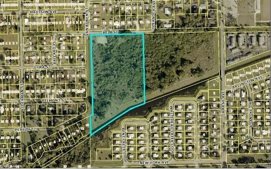 This is a perfect candidate site for an Affordable Housing project. Located west of I-75 (Exit 141), off Palm Beach Blvd, between Bell Street (to north) and Whitehead Creek to south. Walking distance to Billy Bowlegs Park and James Stephens Elementary School. Current zoning of RS-7 allows 7 units /acres. With availability of utilities and FLU of T/C, potential to increase the density by rezoning it to RM12, RM16, or RM 25, or through PUD process, up to 25 units/acre.