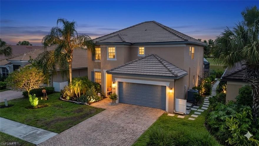 Enjoy nearly 2,600 sq. ft. of comfortable living space in this 4-bedroom plus den, 2.5-bath residence. Positioned on a lakefront lot, this home offers a functional great room floor plan featuring 9ft ceilings and tile/wood-look flooring throughout—no carpet! The kitchen is designed for easy gatherings with a breakfast bar, nook, and adjacent formal dining area. The second floor hosts oversized bedrooms, including a generous primary suite with dual walk-in closets and a bathroom featuring dual sinks, a soaking tub, and a separate shower. Significant mechanical peace of mind is provided by a BRAND NEW AC unit. Outdoor living is a breeze on the full-length screened lanai, featuring a heated saltwater pool and spa. While privacy plantings currently frame the backyard, the property boasts a direct lakefront position. Additional features include a 2-car garage with epoxy flooring, tile roof, storm shutters, and wiring for outdoor lighting. Orange Blossom Ranch residents enjoy a premier amenity package: 2 resort pools, 2 spas, fitness center, tennis, basketball, splash pad, and a social clubhouse. A large-scale floor plan in a prime Naples location with major updates already handled.
