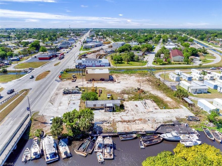 This unique property is located on the East end of Clewiston Fl, with waterfront dock for direct access to Lake Okeechobee. More than 240 feet of U.S. Hwy 27 frontage. Famous Roland & Mary Ann Martin Marina is directly behind the property. There is limited boat storage in town and no indoor boat storage for high end bass boats. There are many great opportunities to this one of a kind property.