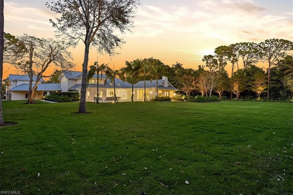 Photo of 88 Eugenia DR, NAPLES, FL 34108 (MLS # 226010797)