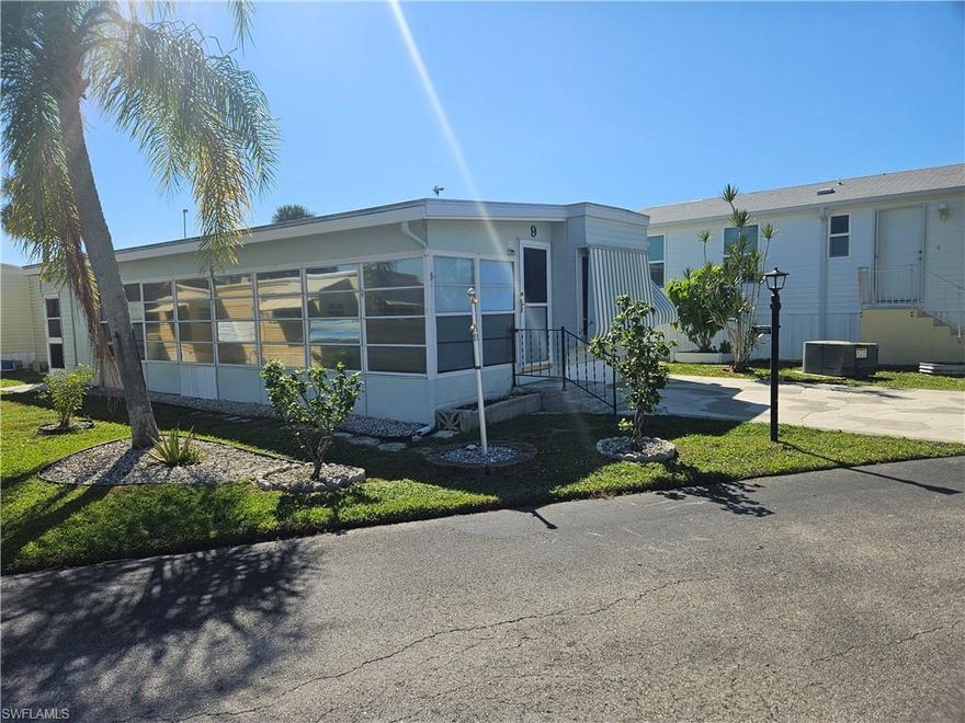 Renovation on this 2 bedroom,  2 bathroom home is underway and is being offered as is for new owner to complete. Ductwork has been disconnected and sealed off making way for mini split units. There are currently 2 window units in use. Appliances are new and included as well as all brand new furniture.Flooring is provided for small bedroom but not installed.It is presently used for a workshop. New light fixtures, some new cabinets and new counter top. Enchanting Shores is the finest park of its kind in the area offering a vast array of amenities and activities as well as being centrally located close to Marco Island and popular downtown Naples.  A multitude of eateries, shops and services are all conveniently nearby. Access to the Gulf of America and boat parking are also available right in this well managed and maintained community.  This park model  awaits your finishing touches which can be done while you also enjoy living in Paradise.