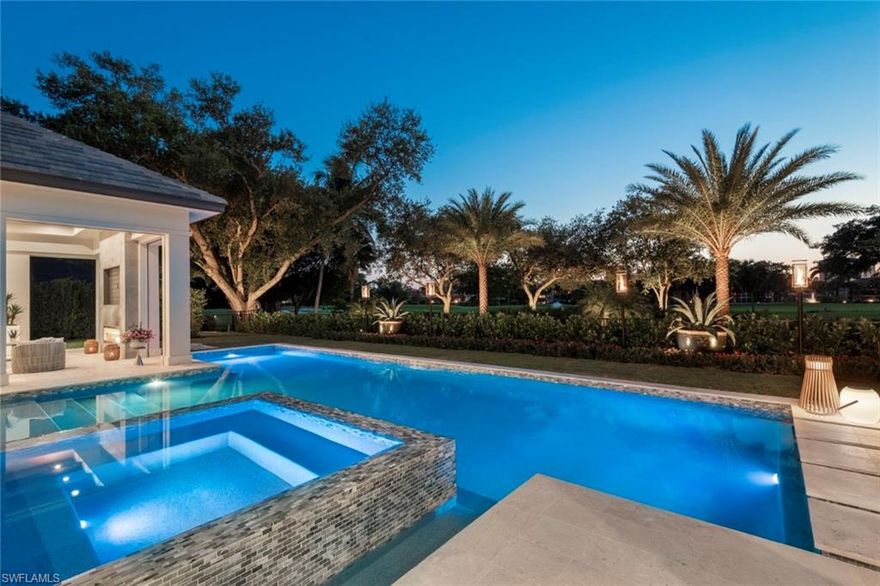 A masterpiece of gracious indoor/outdoor living, this estate home is defined by expansive living spaces, adjoining 50’ resort style pool, and stunning backyard with 180° lake and golf course SW exposure views. 20’ glass walls and floor to ceiling windows frame beautiful vistas in every direction, flooding the home with natural light. Wide plank European oak floors are complemented by imported hand knotted area rugs scattered throughout this coastal chic retreat. Perfect for entertaining, the walnut 800+ bottle wine vault, spacious custom kitchen & butler’s pantry provide a true chefs domain for elegant entertaining. Designed by Stofft Cooney, built by Knauf-Koenig, furnished by Calusa Bay Design with the highest quality finishes, systems & appliances, this 6000 SF smart home offers every upgrade imaginable, all within walking distance to Artis Naples, Waterside Shoppes, and 2 private Pelican Bay beach clubs. Pelican Bay is the hottest location in Naples, and the only community in Naples with 3 miles of deeded beach, an active tennis program, and 27 holes of golf with a stunning brand new clubhouse. This private, gracious, inspiring home is a “must see” for the discerning Buyer.