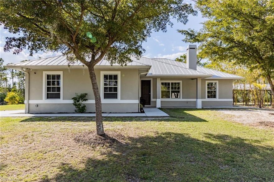 Welcome Home! This 7 acre retreat from the city will be sure to make you feel right at home. This is a custom built home by West Coast Builders. Some custom features include: 9 1/2 ft beam/ Cathedral ceilings,  5 1/4 crown throughout the entire home, tray ceilings with rope lighting, Mana block plumbing, Italian porcelain tile in all wet areas, 42" cabinet uppers, granite counter tops, Wood Burning Fireplace, 8 ft doors, 7 in 1 built-in surround audio, upgraded insulation, wireless security. Seam Metal Roof, Custom Epoxy Floors in the garage,  Hurricane Shutters! Bring the toys and the RV: 20 x 60 Pole Barn & 30 amp RV Hook up. Also a generator switch! In the back of the house, you will find a peaceful wooden deck and a large pergola. HOT TUB included! 
The private gated road will lead you to a circle driveway for your convenience. In the front, you will find a pond stocked with fish. Wildlife will visit the property since the property backs up to Cecil Webb.
This home will be sure to impress, come see it for yourself!!