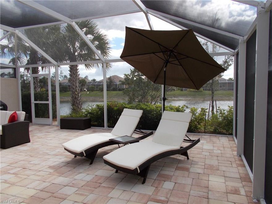 Soak up the Florida Sun and enjoy the long lake view of this 3 Bedroom Two Bath Carrington Model.  The lanai was recently extended with all new custom paving and a retractable awning.  Beautiful plantings are landscaped along the lanai and property.   Custom Plantation Shutters through out the entire home.  Kitchen features granite and stainless steel appliances.  Two car attached garage.  This property has been impeccably maintained by the original owner and is a "must see".