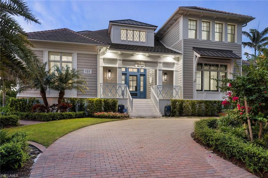 Step into luxury in this meticulously maintained, move-in-ready home in Old Naples, designed by Stofft Cooney Architects and constructed by Big Island Builders. Located just one parcel away from the Gulf's sugar sand beaches, this trophy property is nestled in a prestigious enclave of homes adorned with designer finishes, wall coverings, exquisite fixtures, window coverings and custom cabinetry. No detail has been overlooked. The gourmet kitchen features a Wolf Range, double Wolf wall oven, Sub-Zero wine chiller, and oversized Sub-Zero refrigerator and freezer. A large covered lanai equipped with electronic screens and shutters and built-in grilling station creates an indoor-outdoor paradise. The residence offers 4 oversized ensuite bedrooms and an expansive office/parlor with an ensuite bath. Boasting conveniences like a private elevator, dual-level laundry, generator, a 3 car garage with height for 3 car lifts and plenty of storage, this elegant oasis seamlessly blends understated opulence, comfort, and serenity. A perfect family retreat for relaxation and rejuvenation. This home stands as the epitome of modern elegance fused with comfortable coastal living, an absolute must-see!