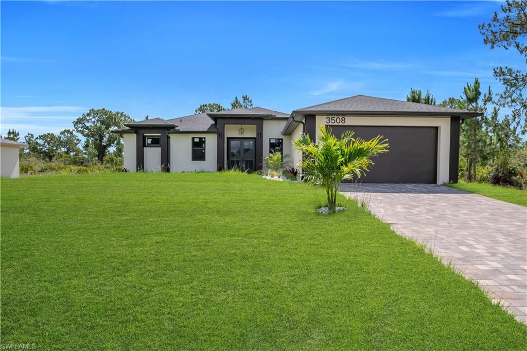 Photo of 3508 Irma AVE N, LEHIGH ACRES, FL 33971 (MLS # 226020415)