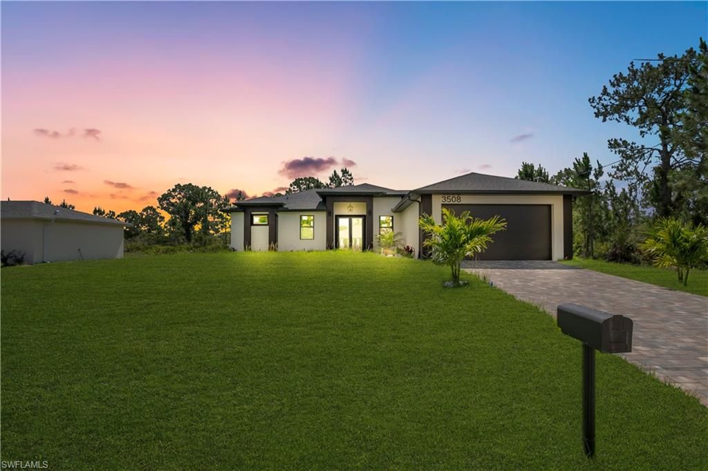 Photo of 3508 Irma AVE N, LEHIGH ACRES, FL 33971 (MLS # 226020415)