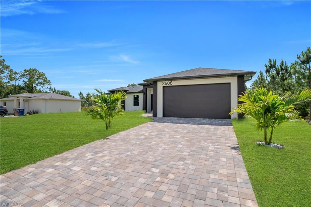 Photo of 3508 Irma AVE N, LEHIGH ACRES, FL 33971 (MLS # 226020415)