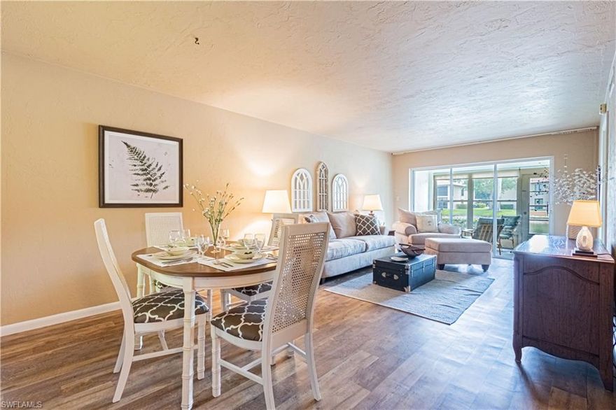 First Floor 2 bedroom, 2 bath Turnkey Furnished condo that is truly a gem.  Located in the close knit, 55 and over, well maintained community of Fountains, this condo offers an eat in kitchen, new vinyl flooring throughout, impact windows, sun shades, spacious split bedrooms for maximum privacy, and lanai with windows and screens overlooking the serene lake.  The condo is steps from the large pool area that also offers a Tiki Bar.  Carport parking and plenty of guest parking.  Conveniently located close to downtown. Don't miss this one!