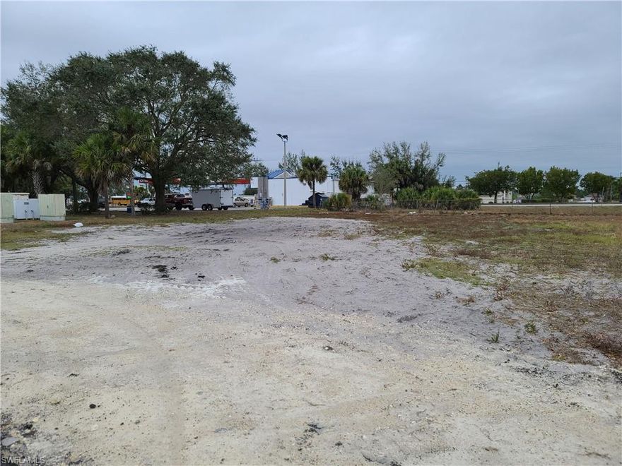 Great location, right near intersection of Sunshine Blvd and Lee Blvd.  Easy access.  Across from Lee County Tax Collector and behind Handy Gas Station.  Chain link fence around back and left side of property.  Contact us today to get your dream business started.  Cleared and ready to build.