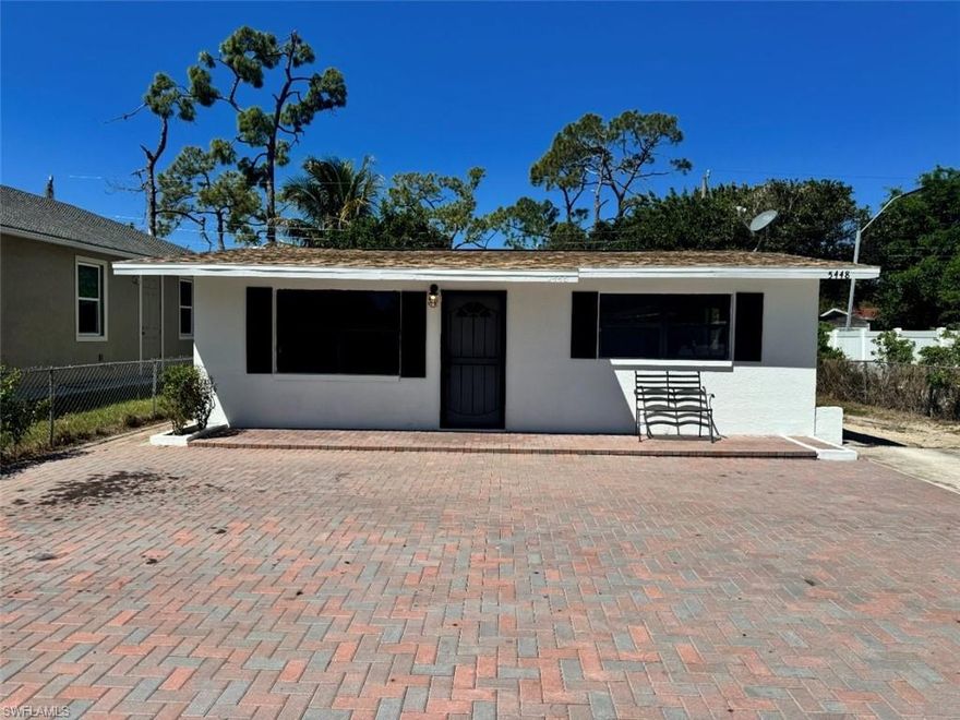 Move-in-ready concrete block house. Two bedrooms, one bathroom with tile throughout the entire house. A new roof in 2022, and a new AC was installed in 2023. New lighting has been installed in all the main living areas. The front is all pavers, allowing for plenty of space for parking. Nice fenced yard with a rolling gate in front for privacy.  The interior and exterior were just painted. Cute little backyard with another paver sitting area ready to make your own. The house is on city water and sewer.