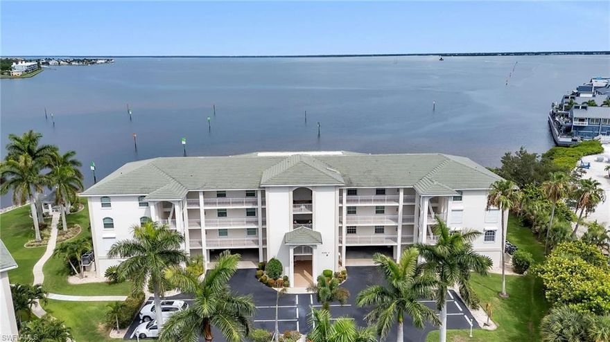 Discover a rare gem in Starboard Point with this 3-bedroom, 2-bathroom condo boasting elegance, class, and an unparalleled view of Charlotte Harbor. Located on the 3rd floor with elevator access and a deeded boat slip just steps away, this home offers the ultimate waterfront lifestyle. Upon entry, a welcoming foyer leads to a separate utility and laundry room featuring stone countertops and ample storage. The open concept living and dining area is perfect for entertaining, complemented by a chef's kitchen featuring a large island, granite countertops, wine
refrigerator, and stylish pearl mosaic backsplash. Hurricane impact sliders open to reveal breathtaking views of Charlotte Harbor, with battery operated roll-down sunshades for comfort. The master bedroom offers a tranquil harbor view and includes a walk-in closet with custom cabinetry and an en suite bathroom featuring dual sinks and a tiled shower. The spacious second bedroom doubles as a study or office, while the third
bedroom enjoys easy access to a shared bathroom. Additional features include hurricane impact windows throughout and a DEEDED BOAT SLIP with a 10,000lb lift. Residents enjoy amenities such as parking, storage, a community library, pickleball and tennis courts, walking and bike paths, and a community pool. Ideally located near dining, shopping, entertainment, Fishermen’s Village, historic downtown, Gilchrist Park, and the Visual
Arts building, with easy access to US-41 and I-75. Experience waterfront living at its finest in this paradise oasis, where every day offers wonder, adventure, and the best of southwest Florida. Don’t miss out—schedule your showing today!