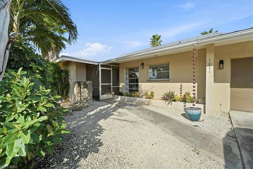 Welcome to 1211 SE 34th St, Cape Coral, FL 33904. MAJOR PRICE REDUCTION! SHORT SALE. NO FLOOD insurance required, METAL roof, 2021 Water Heater, 2019 AC.  This striking 1968 home has many original touches, but all the modern updates. Original Jalousie windows, original cabinets, granite countertops, stainless steel appliances, under-mount sink, tile showers and flooring in bathrooms, ceiling fans, extensive screened lanai, fully FENCED YARD, and great location! The owner's bedroom features a newer split unit to keep it extra cold! Don't miss out on this beautiful SE Cape home, which is within a mile of FINS Seafood and Dive Bar, Point 57 Kitchen & Cocktails, Hooters, and many other amenities. Downtown Cape Coral is a quick drive down Del Prado Boulevard and don't forget Ford's Garage, Slipaway Food Truck Park & Marina, The Bent Brush, and a quick over the bridge to Fort Myers. What an amazing location, close to nearly everything! Room dimensions are approximate.