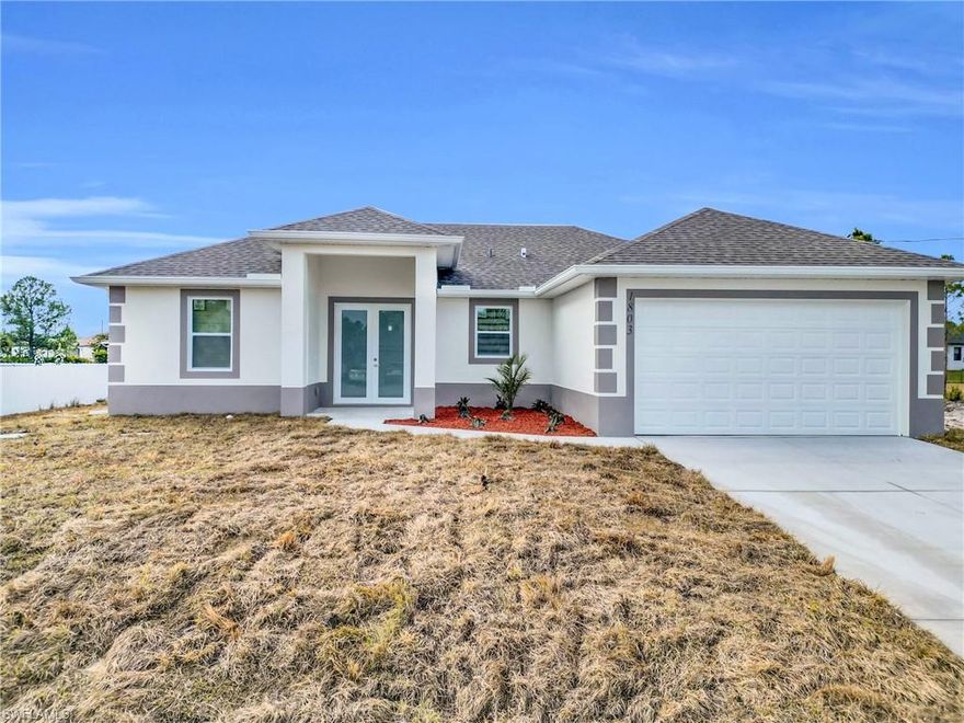 Brand-New Construction in the Heart of Lehigh Acres!
This stunning 3-bedroom, 2-bath home offers 1,535 sq ft of thoughtfully designed living space on a spacious 0.25-acre lot, combining modern style, quality craftsmanship, and everyday functionality.

Step inside to an open-concept floor plan featuring elegant porcelain tile flooring throughout, high-end finishes, and abundant natural light. The modern kitchen is a true showstopper, complete with quartz countertops, stainless steel appliances, sleek cabinetry, and designer touches perfect for entertaining or daily living.

Built with Florida living in mind, this home includes impact-resistant windows and doors for peace of mind and insurance savings, contemporary lighting fixtures, and zebra blinds that add both style and privacy. Every detail has been carefully selected to deliver a move-in-ready experience.

Enjoy the freedom of a large backyard with endless possibilities—room for a pool, outdoor kitchen, or future expansion. Located in a growing area with new homes and strong demand, this property is ideal for homeowners or investors seeking new construction, modern design, and long-term value.