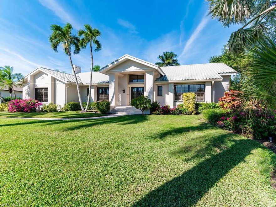 Warm loving tropical breezes await you at this spectacular Marco Island remodeled Estate Home. The sprawling floor plan with 4 bedrooms and 3 full bathrooms showcases 2945 sq ft under air and is perfect for large groups or families alike. The spacious master bedroom on one side of the home looks out to the lagoon pool /spa and has a luxurious updated bathroom that will not disappoint. Attached by the adjoining master bathroom is an additional bedroom or an owner's sitting room / office with an additional full bathroom around the corner. This home also features two large living areas with vaulted ceilings, custom ambient ceiling lighting, a fireplace and small outdoor discrete patio area. Completely remodeled kitchen is fully equip with new appliances.The lanai features a built in bar area with drink fridge, updated lagoon pool / spa and gorgeous water views. To top this glorious property off the deep direct access to the Gulf of Mexico and 125 feet of water frontage the custom 94 ft long boat dock can be home for your large yacht and in addition the 7K lift is a perfect fit for smaller vessels or jet skis.