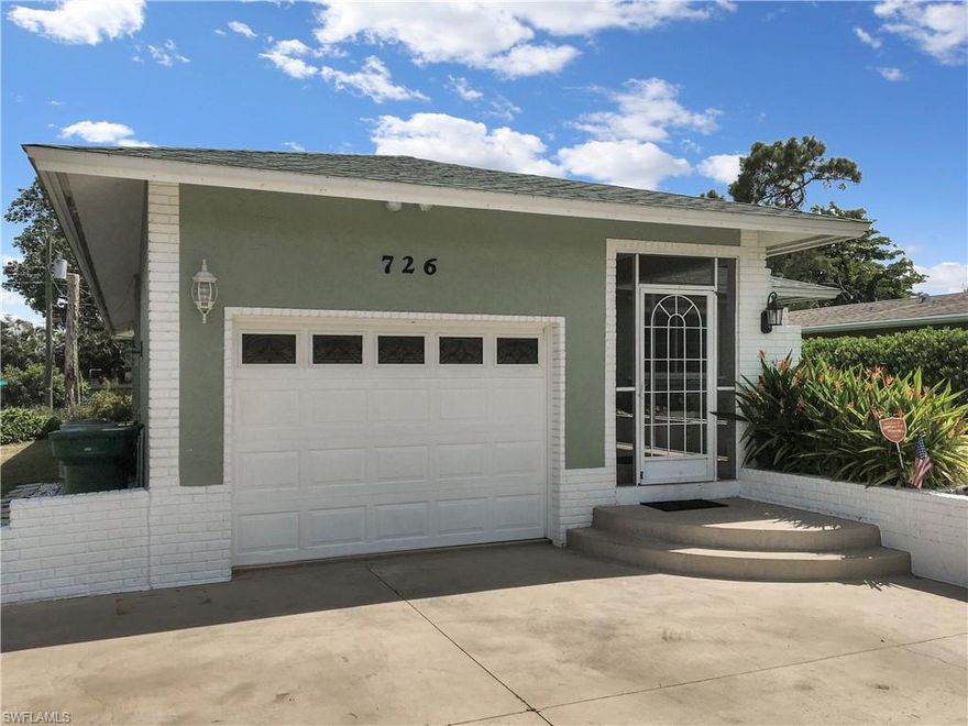 Wow !  It is certainly worth a visit to this spacious 3 bedroom, 2 bath, 1 car garage home in the sought after community of Naples Park.  A new roof was installed in 2018.  The home is carpet free.  There is tile throughout, with the exception of wood laminate in one of the guest bedrooms.  You will find a large walk-in closet in the master bedroom with awesome shelving designed by California Closets.  Both the master bathroom and guest bathroom have nice walk-in showers.  The lanai, which is glassed in and has beautiful plantation shutters, may become your favorite air conditioned room in the house !  The three bedrooms are spacious and can all accommodate king size beds. There is crown molding throughout the home.  A new air conditioner was installed in 2018, the exterior and interior of the house was painted in 2015, and double windows were installed throughout the house approximately 10 years ago.  Beyond the open patio in the back yard, you will discover a wonderful peaceful oasis with several magnificent trees including avocado, mango, and citrus trees.  The home is minutes to Mercato and only 3/4 of a mile to the beach.  There are no association or homeowner fees.