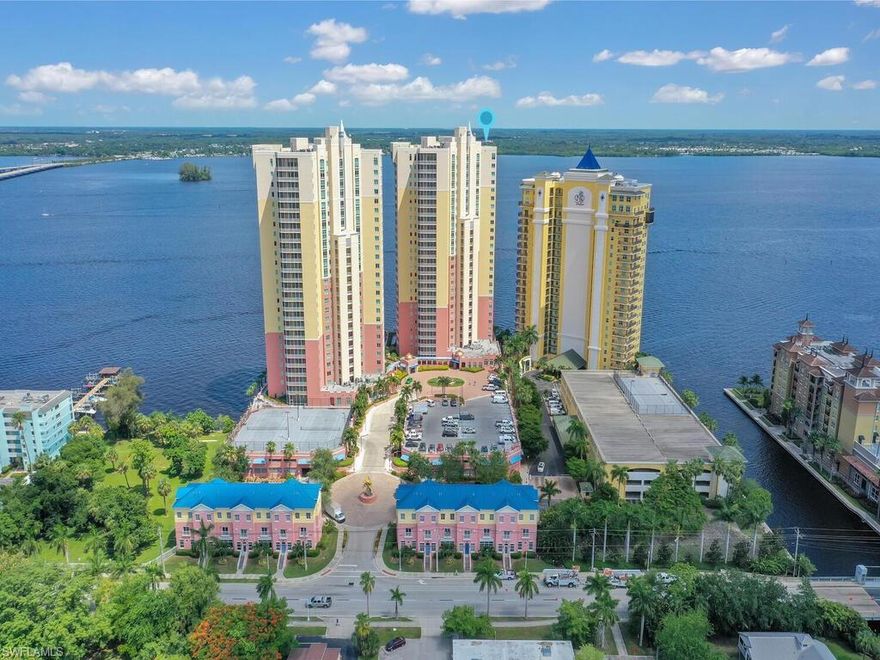 INCREDIBLE rental opportunity on the 10th floor TURNKEY w/ river view condo AND is one of the largest unit in the building! Comfortable layout w/ lots of versatility- great room layout, flex room that is ideal for home office area, laundry room, open concept kitchen, tray ceilings, DOUBLE master suit in split bedroom floor plan, private elevator foyer, dining area & breakfast bar, guest room w/ built-in Murphy bed, and the master suite & guest suite both have private entryways to the L-shaped balcony that overlooks the river. ALL the windows & sliders are hurricane glass giving you optimal storm protection. This unit has one parking space in the covered parking area and comes with a storage unit in the building. St Tropez makes the ideal seasonal home for those wanting to escape the cold, in addition is perfect for an annual home for those who like the low-maintenance riverfront living. There is an on-site gym, as well as 4 pickleball courts. The best part is that you will just be steps away from the redeveloped River District where you can find dining, boutique shopping, theatres, art studios, and night life!