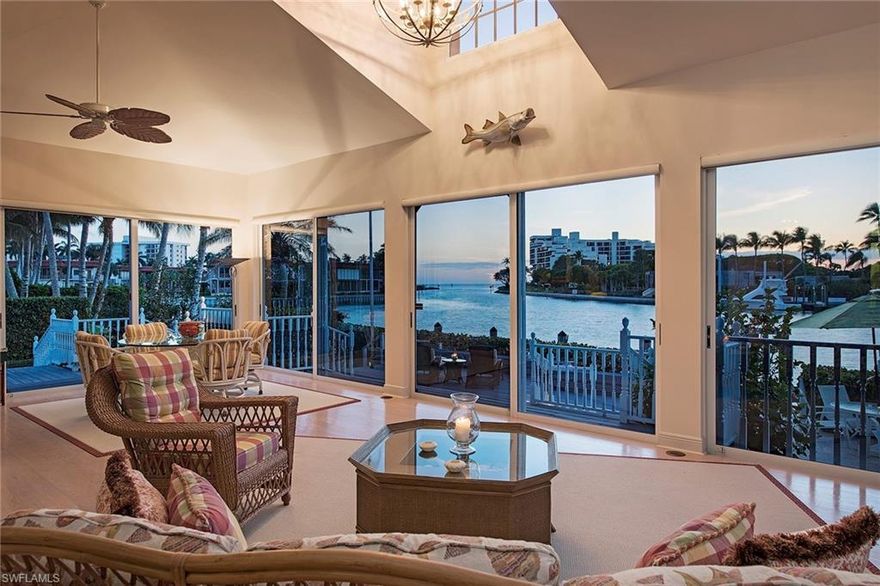 Enjoy the sparkling blue waters and more than 100 feet of spectacular bay frontage directly of Doctors Pass. Own one of the area’s most sought-after locations in Moorings Bay with direct Gulf access. This Florida-style home offers voluminous ceilings, natural wood floors, oversized master bedroom and guest room with breakfast bar and panoramic sunset views from almost every room. An updated kitchen boasts gourmet appliances, farmhouse sink with custom backsplash, new countertops and glass insert cabinets. Entertaining is effortless by the outdoor pool and spa with ample decking and plenty of room to relax and enjoy the soft Gulf breeze. Boating enthusiasts will delight in the large dock with deep-water boat access, lift and no bridges to the Gulf of Mexico. This property is being sold as is.