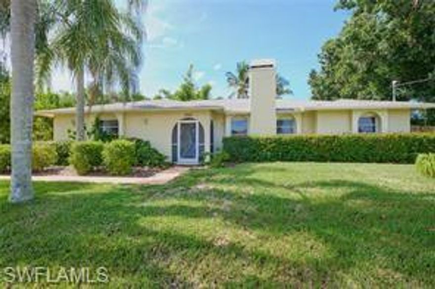 REINTRODUCING at a compelling new value and NOT IN A FLOOD ZONE— a rare opportunity to own a home with true character in a sea of new construction.  With so many newer homes in Cape Coral offering smaller, cleared lots and a more uniform, “one-size-fits-all” feel, properties like this are becoming increasingly hard to find. Set on an oversized .36-acre lot, this home offers something most new builds simply can’t—mature trees, natural privacy, and a backyard that feels alive. Here, you’ll find mango and orange trees, natural bamboo for privacy, a butterfly garden, and even a mature oak—something rarely seen in Cape Coral due to the area’s coral-based soil. It’s a setting that feels established, peaceful, and truly like home. The large screened lanai with sliding glass doors creates an easy indoor-outdoor flow, perfect for enjoying this one-of-a-kind yard. Inside, the home is light and inviting with cathedral ceilings, a wood-burning fireplace, and a comfortable, open layout. The kitchen has been updated with granite countertops, self-closing cabinetry, and a breakfast bar, and both bathrooms have been tastefully renovated. Tile and stone flooring run throughout for a clean, low-maintenance finish. 
Major updates include a newer A/C, hybrid water heater, reverse osmosis system, updated electrical panel, and LED lighting. Built with CBS construction, the home has already proven its durability through three major hurricanes with no wind or water damage. The SIDE-ENTRY GARAGE enhances curb appeal, while the fully fenced yard with gated access provides rare flexibility—ideal for securely storing a boat, work truck, or trailer in compliance with city regulations. A large shed and riding mower are included. ALL ASSESSMENTS ARE PAID!!
Conveniently located near shopping, dining, schools, and parks, with Sun Splash and Lake Kennedy Park just minutes away. If you’ve been looking for something with personality, privacy, and a setting that can’t be duplicated in today’s new construction market—this is it.