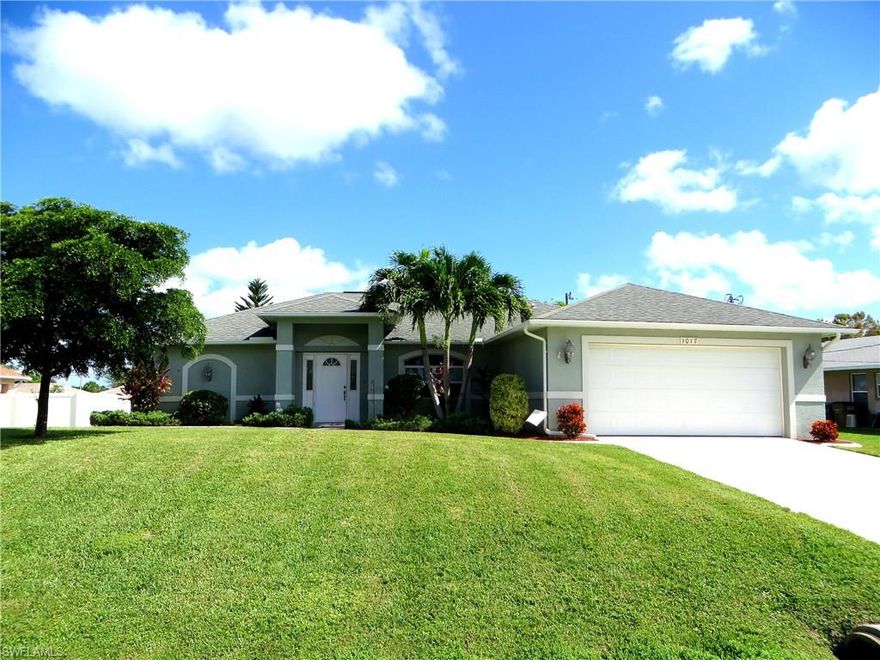 The wait is over…you have just found your new home!  Location…YES, great neighborhood across form lakefront homes.  Condition…YES, one owner home followed by a great tenant for this past year.  Central utilities…YES, assessments in and PAID in FULL. Air conditioner…YES, brand new unit being installed this week.  You have to see this home to appreciate all that it has to offer.  Just look at the photos of the back yard and then imagine sipping your morning coffee while sitting in the screened in lanai overlooking this tranquil setting.  Inside you will be greeted by large neutral tile throughout the main living areas, wet areas and kitchen.  Large living room with pocketed slider out to the lanai. Fully functional kitchen with solid surface counters with raised panel cabinets and pantry.  Upgraded smooth top oven, microwave mounted above, side by side refrigerator with water and ice dispenser.   Huge master bedroom with a sitting area and a bathroom with large shower with shampoo niche and dual vanity.  Inside laundry room with utility sink and storage cabinets. Thanks for viewing.