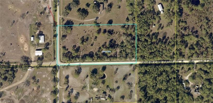 % acres land-cleared in past.  Few trees   Entrance in Beautiful corner lot.  No septic or well.