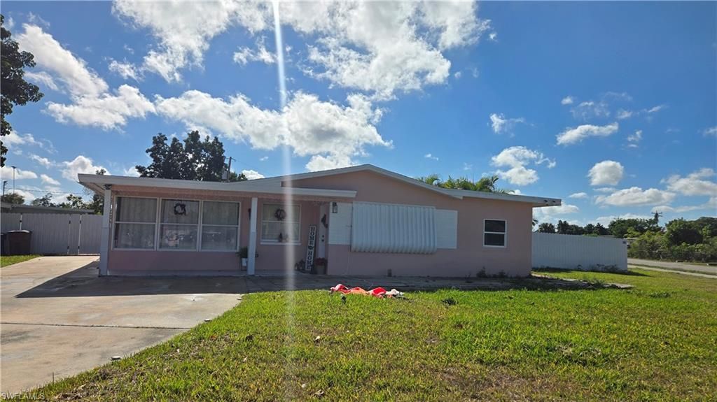 Photo of 10 E Jersey RD, LEHIGH ACRES, FL 33936 (MLS # 226004728)