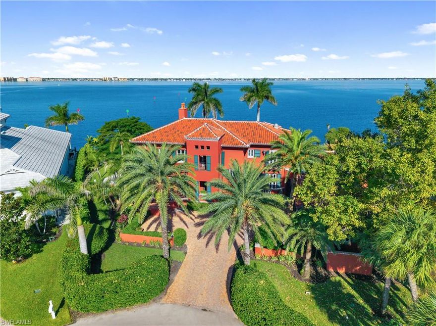 Welcome to 5844 Riverside Lane. Experience timeless elegance in this exquisite old-world estate designed by renowned architect W.A. Bud Lawrence. Perfectly positioned along the Caloosahatchee River, this home exudes charm and character unlike any other property on the market today. Boasting an exceptionally rare 177 feet of river frontage and an expansive backyard complete with a basketball court, the sense of space, privacy, and exclusivity is unmatched. With over 4,800 square feet of living area, the home features four generously sized bedrooms, an upstairs den, a temperature-controlled library, a TV room, a formal dining area, a breakfast nook with some of the best views in the home, and a grand living room with soaring ceilings. Step outside the kitchen to discover multiple intimate courtyard seating areas that evoke the ambiance of a Mediterranean villa. The pool area offers breathtaking river views, a comfortable pool size, and ample deck space for lounging or entertaining. Distinctive architectural details include copper gutters, Venetian plaster walls, tongue-and-groove wood beam ceilings, hand-carved solid wood doors, custom metal railings, authentic buckshot-detailed wood floors, Mexican Saltillo tile, and Chicago brick accents throughout. Modern upgrades complement the craftsmanship, including a new tile roof (2023), new dock (2023), newer HVAC systems, impact-rated windows and doors, premium kitchen appliances, and a 500-gallon buried propane tank. Constructed entirely of concrete block on both levels, this home offers enduring built quality and strength rarely found in homes today. Located in the Sunset Cove neighborhood off of McGregor Boulevard, one of Fort Myers’ most coveted waterfront enclaves, this residence provides convenient access to Downtown Fort Myers, Sanibel Island, Fort Myers Beach, RSW International Airport, premier shopping and dining, top-rated schools, and so much more. Embrace the unmatched lifestyle offered at 5844 Riverside Lane where old-world craftsmanship meets modern luxury on the banks of the Caloosahatchee.