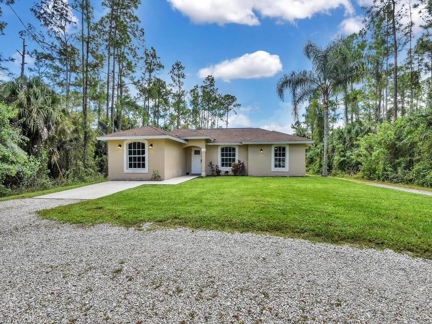 Beautiful 3 bedroom 2 bathroom home with additional den situated on 1.14 acres in Golden Gate Estates. Master bathroom has been recently updated and home is freshly painted. Enjoy the vaulted ceilings and the space that this house offers. Two car aluminum carport is a bonus! This one is move in ready and won't be on the market long. HIGHEST AND BEST OFFERS BY 5 PM WEDNESDAY, OCTOBER 14, 2020.