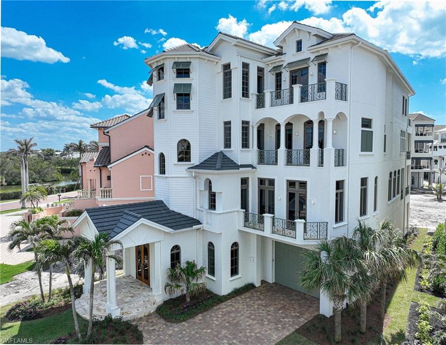 Only the finest amenities & features can be found in this 4 story Barefoot Beach home including nearly 7,000 Sq ft of AC living with wide Gulf views over the redesigned Beach garden, a new large tropical pool with sun shelf, spa, fire pit, larger deck, brick walkways and all new landscaping (completion March 31, 2025), solid concrete construction, hurricane impact windows & doors, electric shutters & screens, voluminous ceiling heights w/dramatic details, wide halls & private elevator to all floors. The main level features an open floor plan with great room with new impact sliding glass doors to maximize Gulf views, a gourmet kitchen boasts the highest quality appliances and includes a rear kitchen area for parties, butler's pantry and open dining room that all lead to a large covered Lanai with summer kitchen with gas grill, electric screens and shutters. A large office and powder bath complete the main level. The 3rd floor includes 3 large private guest suites w/ full baths, private lanais, separate laundry & open den area for guests. 4th floor features master suite & includes private lanai & sitting area w/stunning Gulf of America views and sunsets. The spacious master bath offers a soaking tub, large walk-in shower & artist etched glass. The master closet is unmatched in the quality of cabinetry and space. A 5th bedroom with bath completes the 4th level.  The first level features a beautiful foyer entrance and enough garage space for 4 cars plus gulf cart and toys.  The home has been recently painted inside and out, has a new generator installed, all new air conditioners and hot water heaters  and offers state of the art electronics & security system. This homes furnishings are negotiable For an easy move in with no hassle. Seller will lease back through the summer if Buyer is not planning to use the home then.  Barefoot Beach homes amenities include gated entrance with 24 hour guard patrols, beach garden pool, private beach, tennis & pickleball courts, fitness & clubhouse. Option to purchase boat dock across the street - separate contract. Also option to join the Club at Barefoot Beach (located within the community) which offers casual and fine dining restaurants, pool & beachside food, drinks and chair service, indoor & outdoor bars, tennis courts with pro & a full events calendar. (waitlist with limited usage during wait period). Barefoot Beach is centrally located to dining, entertainment, golfing, arenas in Naples and Bonita Springs and is close RSW Airport, the Promenade, Coconut Point, Mercato & Waterside Shops and Old Naples. Note: Barefoot Beach is currently being renourished/widened and is slated to be completed in April 2025.