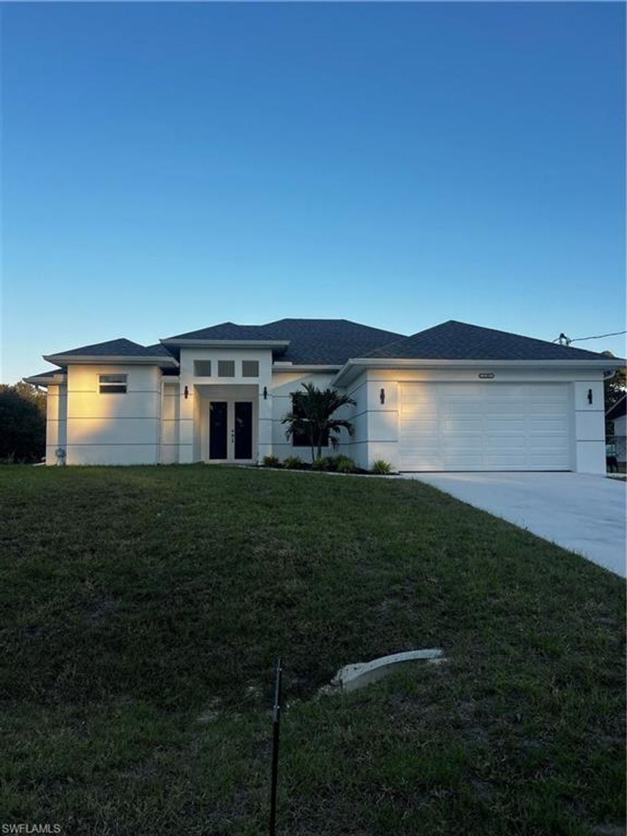 MOTIVATE SELLER. This beautiful brand new home is located on a Half Acres of Lehigh Acres FL, and built with care and dedication. We offer CLOSING INCENTIVES! This luxurious new construction home combines modern elegance with thoughtful design.Nestled in a serene neighborhood, this stunning 3-bedroom plus den, 2-bathroom home boasts a spacious open floor plan, perfect for both relaxation and entertaining. The home has impact resistant windows and impact resistant doors for storm protection. As you enter, you're greeted by soaring ceilings and an abundance of natural light that creates an inviting atmosphere throughout. The heart of the home features a chef-inspired kitchen with high-end stainless steel appliances, quartz countertops, and a large island, ideal for casual dining and gatherings. The expansive living area flows seamlessly into the dining space, showcasing beautiful finishes. This space is perfect for hosting friends and family. The master suite is a tranquil retreat with a spacious layout, walk-in closet, and an en-suite bathroom featuring dual vanities, a soaking tub, and a glass-enclosed shower. Two additional well-appointed bedrooms offer ample space and comfort. The bonus den provides endless possibilities—perfect for a home office, playroom, or guest space. Enjoy the spacious backyard, ideal for outdoor entertaining and plenty of space for a pool. Schedule your private showing today and experience the lifestyle you’ve always dreamed of! You won’t be disappointed, Won’t last long