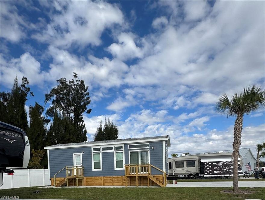 Welcome to Lot 358 at Palm Breeze RV Resort, where effortless Florida living meets flexible ownership. Here is where space, privacy, and convenience come together. This oversized RV lot measures 40 x 80, offering approximately 3,200 square feet—providing plenty of room to personalize your outdoor living area with a tiki hut, outdoor kitchen, expanded paver pad, upgraded landscaping, and more to create your own resort-style retreat.

This beautifully positioned site features a park model cottage offering the blend of comfort, convenience, and and resort-style lifestyle.  Step into a thoughtfully designed space that allows you to unwind, relax and entertain - all within one of southwest Florida's newest RV resorts.

This well-positioned lot backs directly to a privacy fence, creating a quiet and secluded rear setting ideal for relaxing or entertaining. Located directly across the street from resort amenities, you’ll enjoy easy access to the clubhouse, pool, and community gathering spaces while still maintaining a peaceful and private atmosphere at your site.

Surrounded by beautifully maintained grounds, Lot 358 offers the perfect balance of accessibility and tranquility. Whether you’re seeking a seasonal escape or an investment opportunity in one of Punta Gorda’s newest luxury RV communities, this property presents a prime opportunity.

Palm Breeze RV Resort is conveniently located near Punta Gorda Airport, Interstate 75, shopping, dining, and waterfront attractions, and is just a short drive to Fort Myers and Venice.