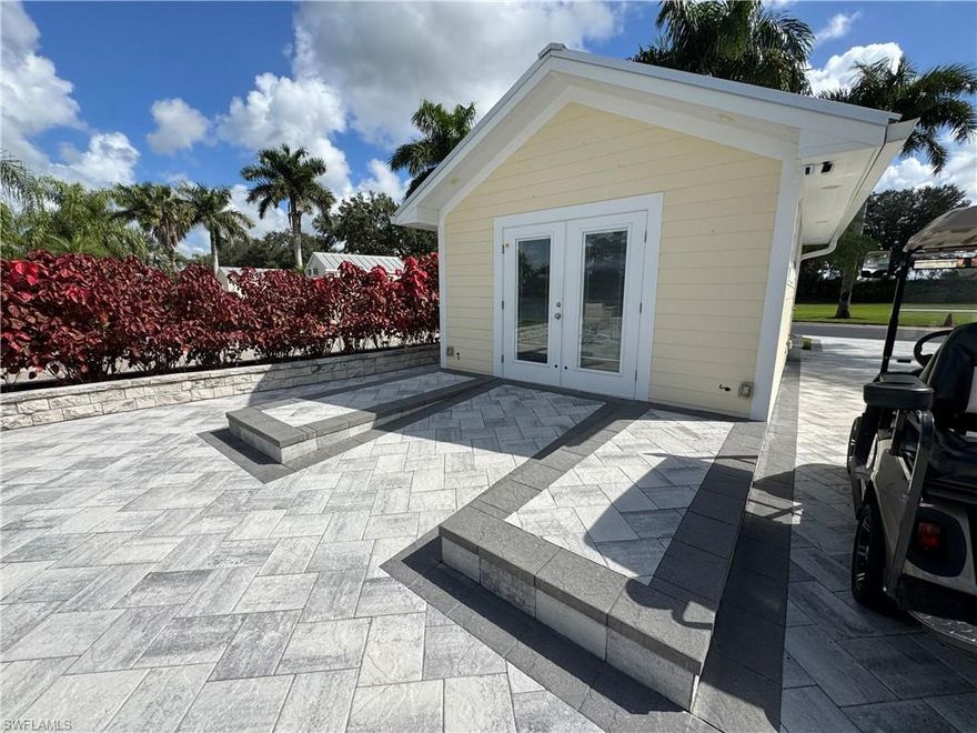 Lot 271 Sunsets, Fountains & Pure Florida Magic. Welcome to Lot 271, where every day begins with sunshine and ends with a sunset that takes your breath away. Perfectly positioned on Grand Lake, this waterfront beauty delivers a front-row seat to one of RiverBend’s most enchanting views. By day, the sparkling lake glistens beneath the Florida sun, and by night, the dancing fountains shimmer under the lights, setting the stage for the perfect evening on your expansive lanai. The oversized lanai is where you’ll spend your happiest hours—coffee in hand at sunrise, lazy afternoons with friends, or a quiet evening cocktail as the sky turns gold and pink over the water. It’s an entertainer’s dream and a peaceful retreat all in one, with plenty of room for lounging, dining, and soaking in those “this is the life” moments. Step inside the 14' x 20' coach house, a thoughtfully designed space blending comfort and style. You’ll find impact windows and doors, floating plank floors, a New split mini A/C, and a tankless water heater every detail crafted for easy living. The spacious laundry room and beautifully tiled bathroom add convenience, while a built-in outdoor storage closet keeps your essentials neatly tucked away.
Beyond your doorstep, RiverBend Motorcoach Resort delivers a lifestyle that’s equal parts relaxation and recreation. Start your morning with yoga in the community room or water aerobics in the heated pool, then join friends for a round of bocce, pickleball, or shuffleboard. Take a scenic golf cart cruise over the walking bridges, or cheer on the action at the R/C race track. As the day winds down, head to the River Clubhouse Tap Room for trivia night, laughter, and stories shared with neighbors who soon feel like family. From holiday golf cart parades to friendly Texas Hold’em games, there’s always something fun on the calendar. With over 1,000 feet of private river frontage, a boat ramp, slips, and trailer storage, boaters can chase the sunset down the Caloosahatchee River whenever the mood strikes. Lot 271 isn’t just a place to park your coach it’s your personal escape to paradise. Here, every sunrise brings promise, every sunset brings peace, and every day reminds you how sweet life can be at RiverBend. Golf cart and pizza oven not included. Seller is open to owner financing.