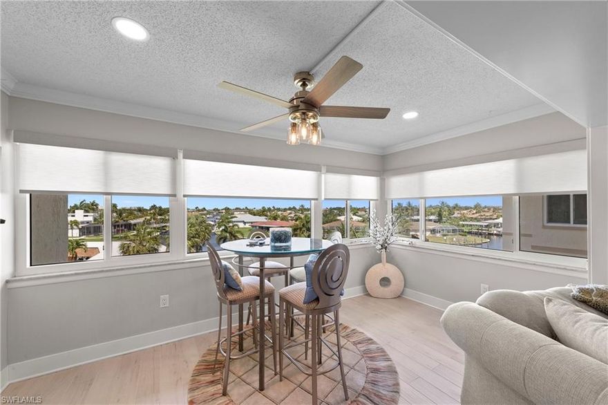 With $150K in renovations, this top-floor unit will have you feeling like you live in the penthouse WITHOUT the penthouse price! Located minutes from open water, and close to shopping, beaches and restaurants, this GEM is a perfect winter retreat or year-round residence. High-end updates include kitchen cabinets, countertops, windows, flooring, appliances, marble in the bathrooms, closet build-ins, custom laundry room and more! Resort-style amenities round out the beautiful, water-front setting — and don't forget your boat — as you can lease up to 32' of the community dock space (800' in total). The value-added HOAs take care of everything allowing you to simply enjoy worry-free SW Florida living!