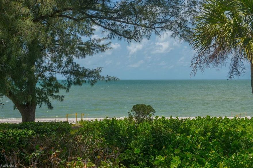 Situated on a peaceful, quiet cul-de-sac on prestigious West Gulf Drive this beachfront home offers stunning views of the Gulf of Mexico. Upon entering this residence, you will experience an expansive wall of sliding glass doors framing the gulf. The spacious living room and kitchen are part of an open floor plan featuring soaring ceilings, hardwood flooring, and pocketing sliding doors in the front and back of the home for maximum airflow.  With sunlight streaming in, open deck access from the living room, and a screened in porch, this home is in perfect harmony with the natural vegetation that surrounds it. An enormous pool on the east side of the house allows for maximum sun exposure and lap swimming! Frolic in the surf, be lulled by the sounds of the gulf, take in a “green flash” as the sun sets over the emerald water, or watch the sea turtles nest by the full moon from this highly sought after West Gulf Drive address. This sale is “As-Is”.