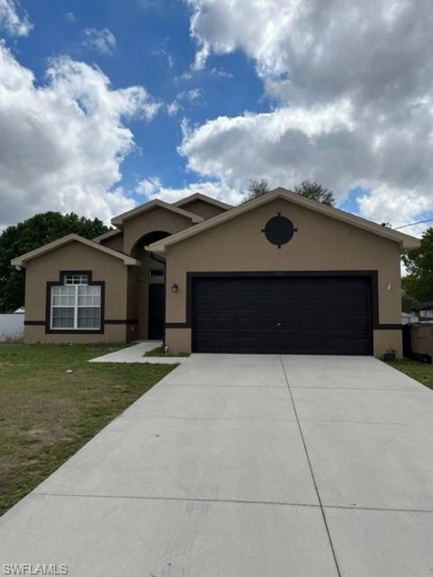 COME TAKE A LOOK!!! Well maintained 3 bedroom with Den 2 bath single story home located in Lehigh Acres on a dead end street! Surrounded by newer homes! Updated flooring! 10' ceilings throughout! Ready for you to enjoy the Florida life style!