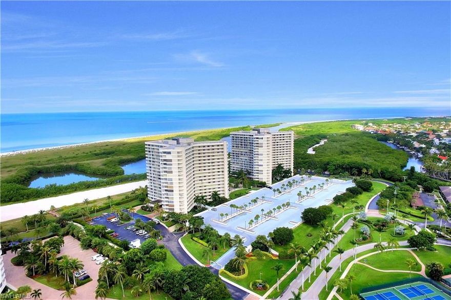 Experience beach front living with this stunning light filled 2 bedroom 2 bath end unit condo in the highly sought-after amenity rich South Seas Club. Offering stunning views of the Gulf and Marco Island's famous white sandy beaches, delivering the relaxed elegance of true coastal living. Located in highly sought after 06 stack this end unit offers a wall of windows and the spacious wrap-around balcony is the perfect place to start your morning with coffee or unwind in the evening while taking in spectacular sunsets over the water. Inside, the bright open layout is designed to capture natural light and showcase the incredible beachfront setting. The updated kitchen features granite countertops, stainless steel appliances, a breakfast bar, and access to a private 2nd patio--ideal for casual outdoor dining and seperate dining area. The generous primary suite offers a peaceful retreat with water views, a walk-in shower, granite counter tops in the bath. Additional highlights include plantation shutters, tile flooring throughout, impact windows and sliders, two balconies, beautifully updated and being sold turnkey furnished. Perfect for full time living, part time vacation condo and great investment as weekly rentals are allowed. Residents of South Seas Club enjoy an exceptional array of resort-style amenities including private beach access, community pool, pickleball and tennis courts, fitness center, community boat docks, kayak and paddleboard storage, waterfront walking paths, tiki huts, grilling areas, and 24-hour gated security. Located just moments from the best dining, shopping, and entertainment on Marco Island, this beachfront residence offers the ultimate island lifestyle. THIS IS A MUST SEE!!