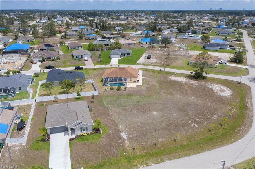 Great Oversized Lot is ready for you to build your dream home.  Get your plans drawn up and get ready to build on the wonderful lot.  Home that is a rear of lot is also for sale (223029048), would be great for someone that wants an extra large lot. Convenient to all that SW Florida has to offer.  Edge of lot at the frontage has nice palm trees.