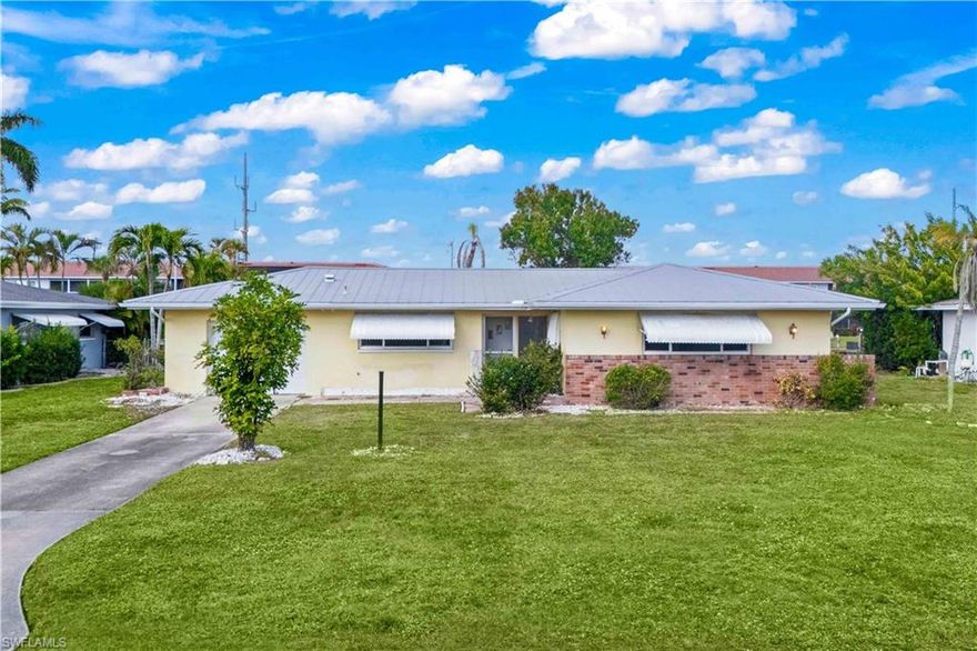 SAILBOAT GULF ACCESS – MINUTES TO OPEN WATER!
Located on a wide canal with no bridges and direct Gulf access, this waterfront property offers exceptional boating convenience just minutes to the Caloosahatchee River and the Gulf of Mexico. The property features a concrete dock and an outstanding waterfront lot ideal for boaters, investors, or buyers seeking a prime Cape Coral location.
The home includes significant interior upgrades already completed, including a remodeled kitchen with new cabinetry, a large pantry cabinet, granite countertops, classic subway tile backsplash, newer stainless steel appliances, and a built-in wine cooler. The bathrooms have been updated, and new tile flooring runs throughout the home, creating a clean and cohesive look. Impact-resistant windows and a metal roof provide added storm protection and durability.
A large Florida room offers additional flexible living space, perfect for relaxing, entertaining, or enjoying canal views year-round.
While renovations were not fully completed, the property presents multiple value opportunities—finish the remaining improvements to create a customized waterfront residence or utilize the exceptional sailboat-access lot as a potential teardown for new construction. This versatility makes the property appealing to end-users, investors, and builders alike.
No HOA or rental restrictions. Conveniently located near shopping, dining, and downtown Cape Coral while offering quick boating access to open water.